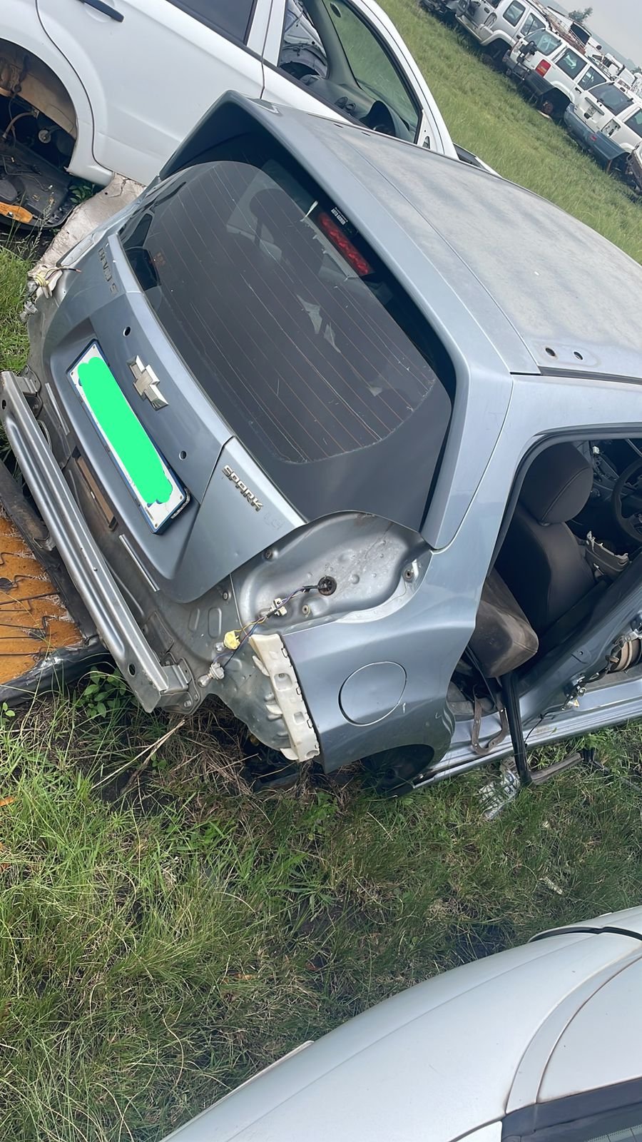 2012 Chevrolet Spark tailgate and glass