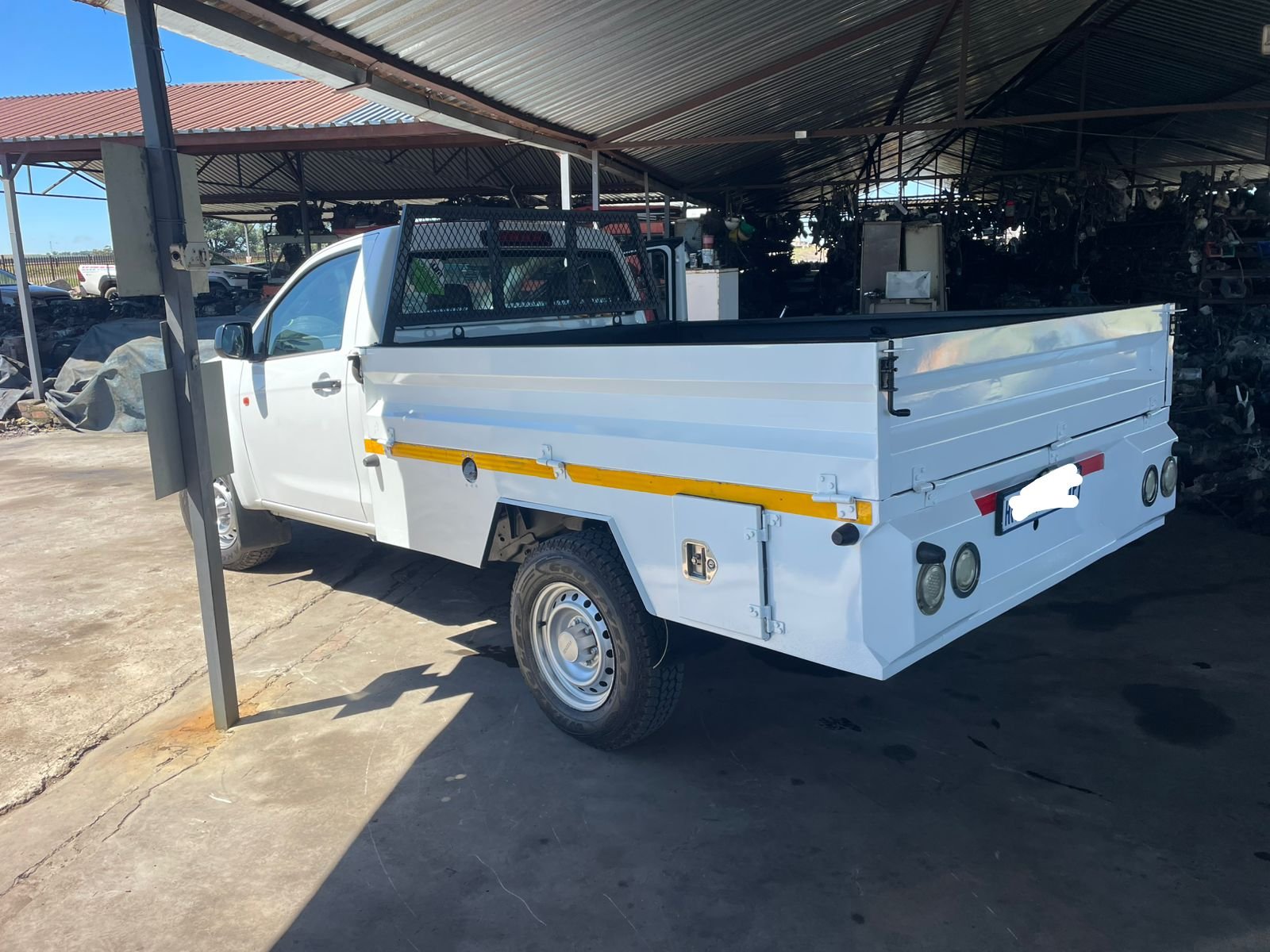 Isuzu D-Teq drop side load bin available