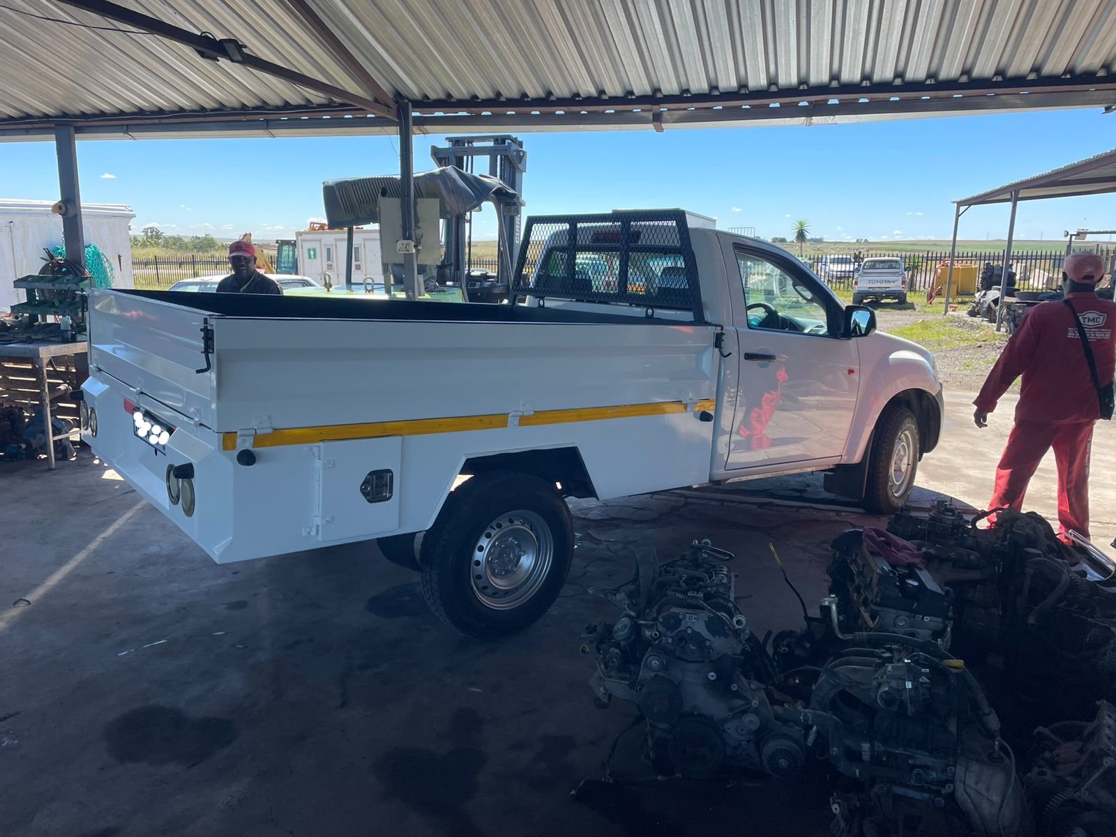 Isuzu D-Teq drop side load bin available